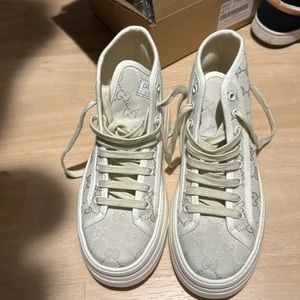 Gucci high top sneakers  Worn but in good shape . GG Canvas  High-Top Sneaker